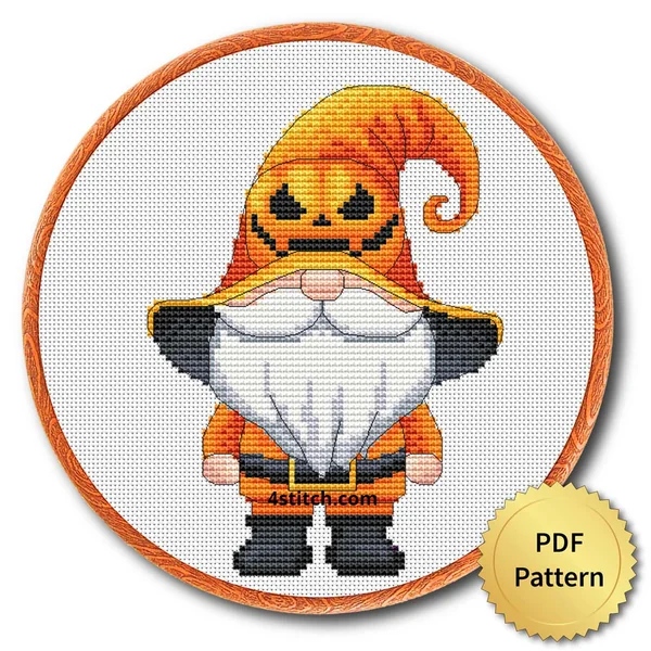 Jack-o'-Lantern Hat Gnome displayed on white Aida in a wooden embroidery hoop with a PDF pattern badge