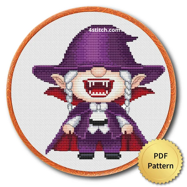 Vampire Halloween Gnome displayed on white Aida in a wooden embroidery hoop with a PDF pattern badge
