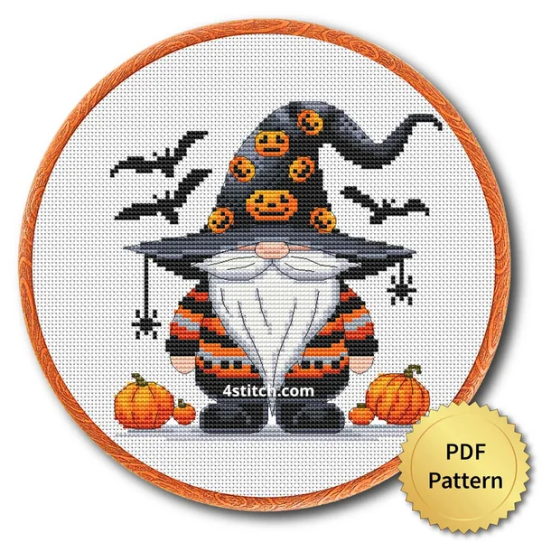 Pumpkin Patch Witch Gnome displayed on white Aida in a wooden embroidery hoop with a PDF pattern badge