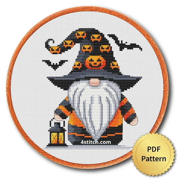 Lantern Witch Gnome displayed on white Aida in a wooden embroidery hoop with a PDF pattern badge
