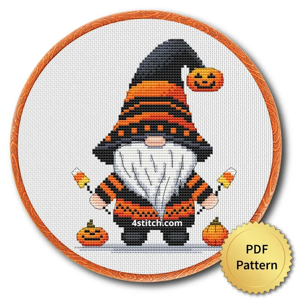 Black and Orange Witch Gnome displayed on white Aida in a wooden embroidery hoop with a PDF pattern badge