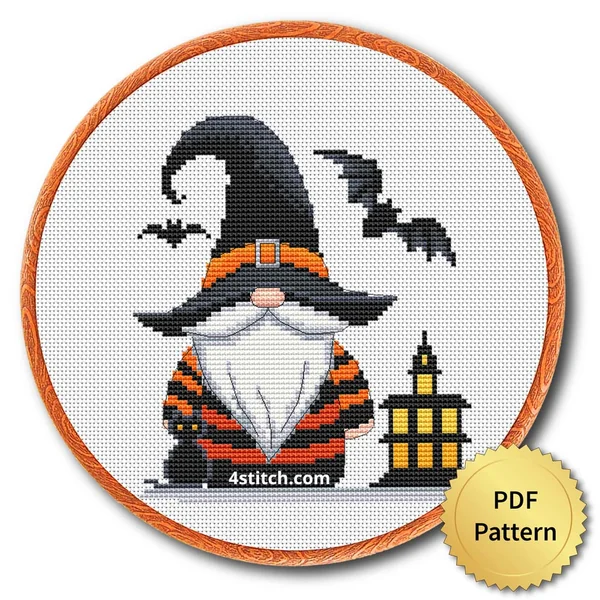 Lantern Witch Hat Gnome displayed on white Aida in a wooden embroidery hoop with a PDF pattern badge
