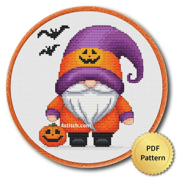 Pumpkin Hoodie Halloween Gnome displayed on white Aida in a wooden embroidery hoop with a PDF pattern badge