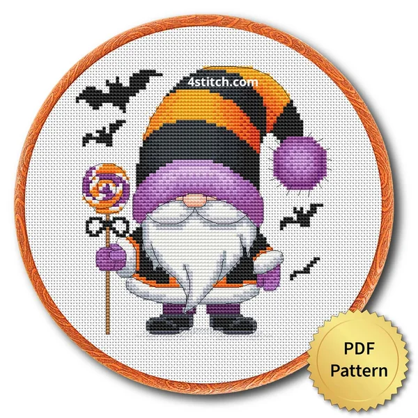 Lollipop Witch Halloween Gnome displayed on white Aida in a wooden embroidery hoop with a PDF pattern badge