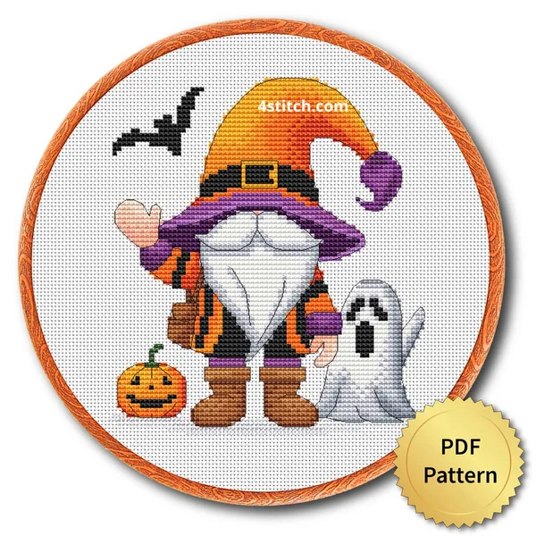 Witch and Ghost Halloween Gnome displayed on white Aida in a wooden embroidery hoop with a PDF pattern badge