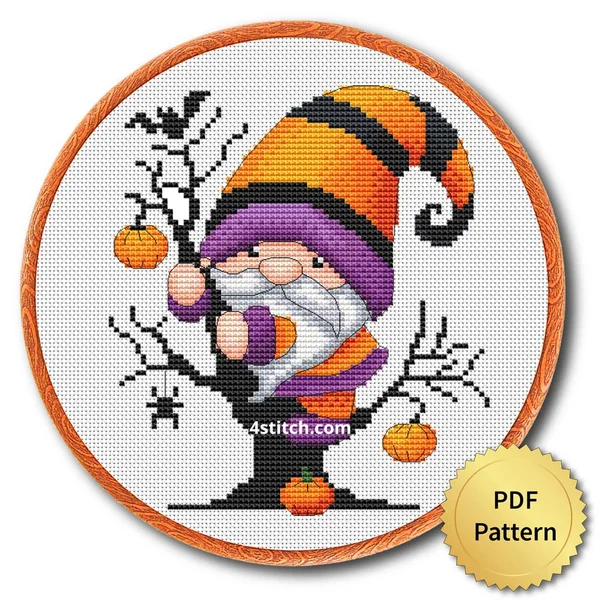 Pumpkin Tree Halloween Gnome displayed on white Aida in a wooden embroidery hoop with a PDF pattern badge