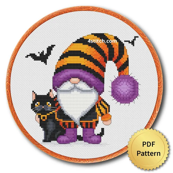 Striped-Hat Black Cat Gnome displayed on white Aida in a wooden embroidery hoop with a PDF pattern badge