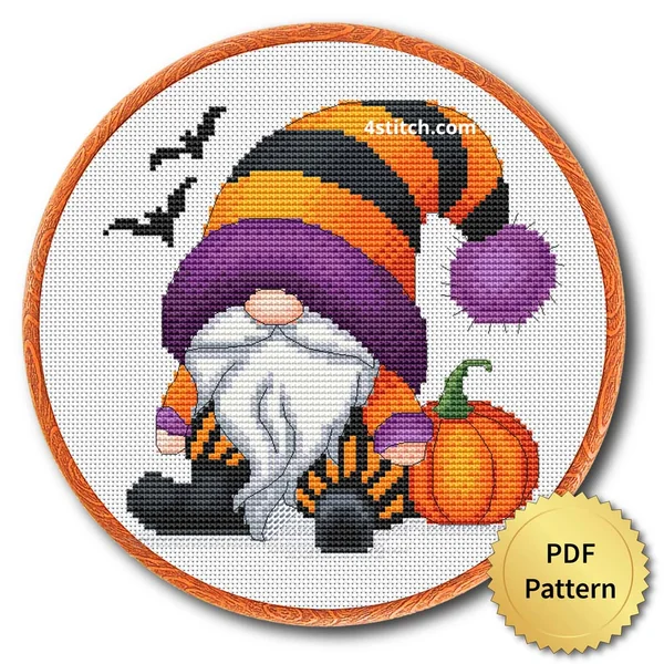 Pumpkin Patch Gnome displayed on white Aida in a wooden embroidery hoop with a PDF pattern badge