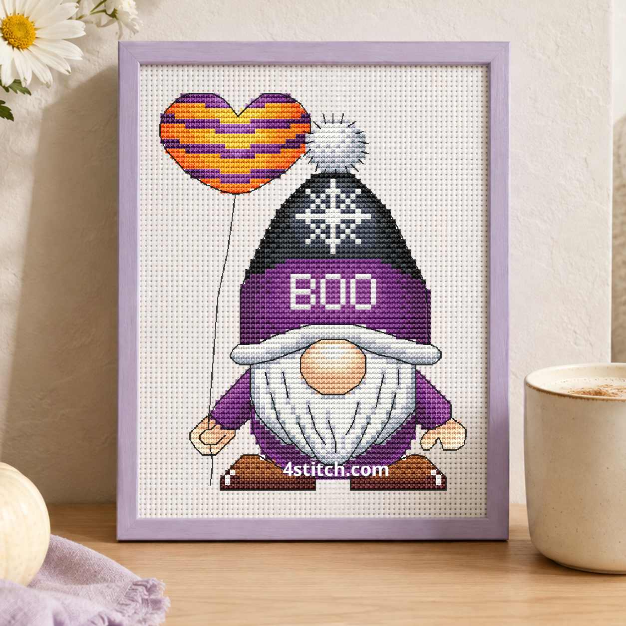Boo Balloon Halloween Gnome on white Aida in a small frame, photographed close up in a bright cozy autumn interior