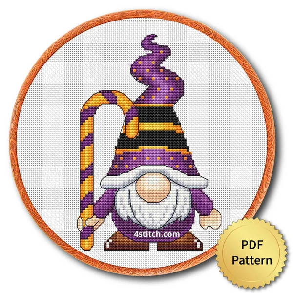 Candy Cane Witch Gnome displayed on white Aida in a wooden embroidery hoop with a PDF pattern badge