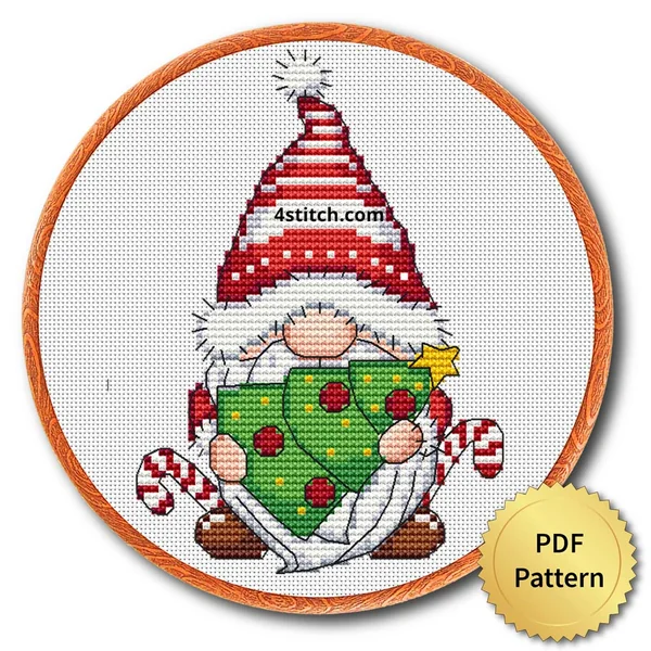 Finished christmas ornament gnome cross stitch design in a wooden embroidery hoop