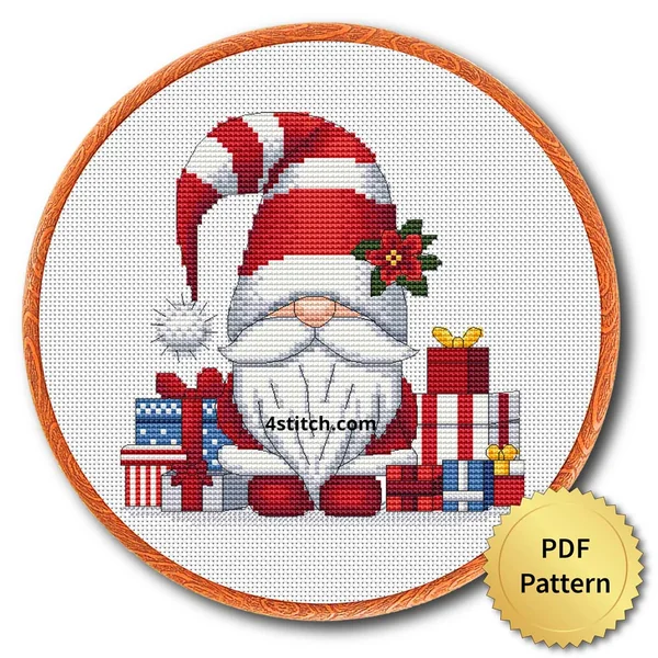 Christmas Gifts Gnome Cross Stitch Pattern shown as finished cross stitch in an embroidery hoop with a gold PDF Pattern medal.