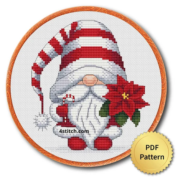 Poinsettia Christmas Gnome Cross Stitch Pattern shown as finished cross stitch in an embroidery hoop with a gold PDF Pattern medal.
