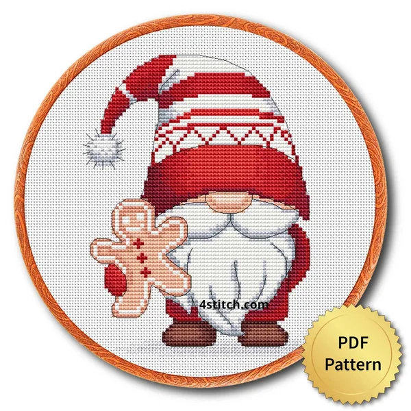 Gingerbread Cookie Christmas Gnome Cross Stitch Pattern shown as finished cross stitch in an embroidery hoop with a gold PDF Pattern medal.