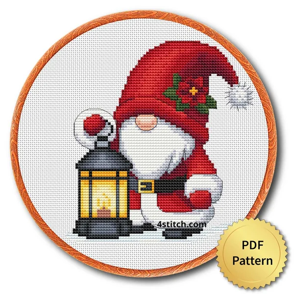 Christmas Lantern Santa Gnome cross stitch design in an embroidery hoop with a PDF Pattern medal