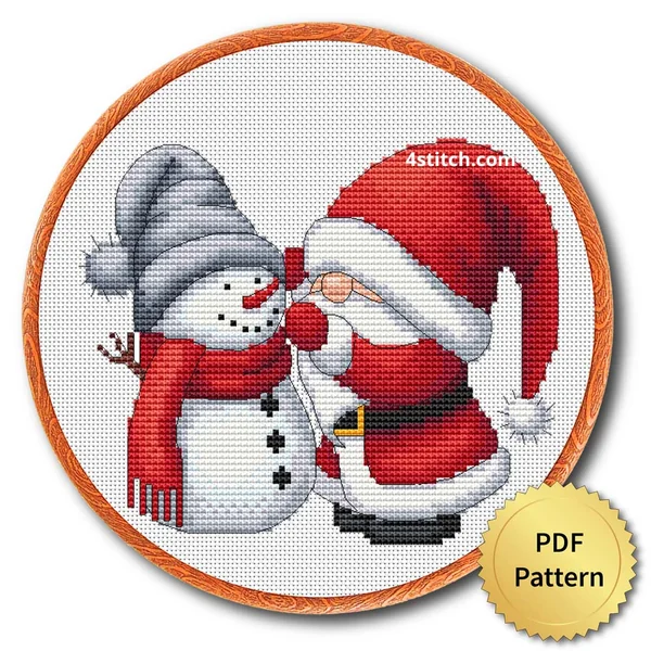 Snowman Kiss Santa Gnome cross stitch design in an embroidery hoop with a PDF Pattern medal