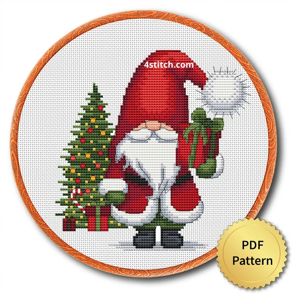 Christmas Tree Gift Gnome cross stitch design in an embroidery hoop with a PDF Pattern medal