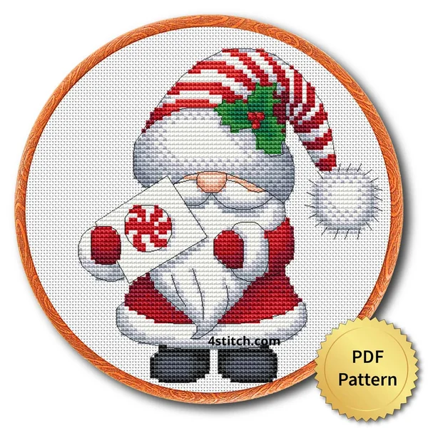 Peppermint Gift Santa Gnome cross stitch design in an embroidery hoop with a PDF Pattern medal
