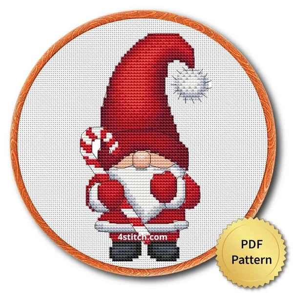 Candy Cane Holding Santa Gnome cross stitch design in an embroidery hoop with a PDF Pattern medal