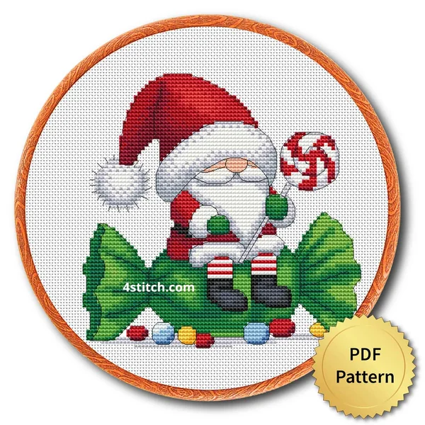 Peppermint Tree Gnome cross stitch design in an embroidery hoop with a PDF Pattern medal