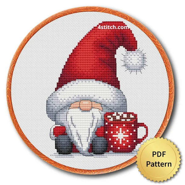 Red Mug Santa Gnome cross stitch design in an embroidery hoop with a PDF Pattern medal