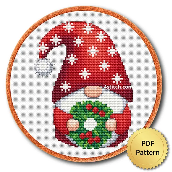 Snowflake Wreath Christmas Gnome cross stitch design in an embroidery hoop with a PDF Pattern medal