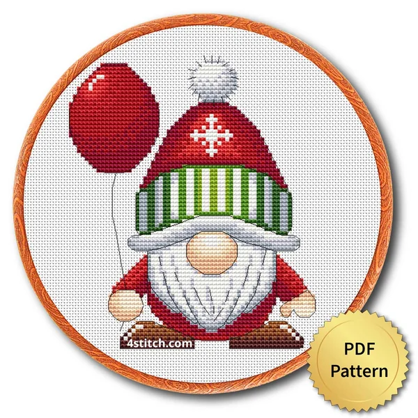 Red Balloon Christmas Gnome Cross Stitch Pattern shown in an embroidery hoop with a gold PDF Pattern medal