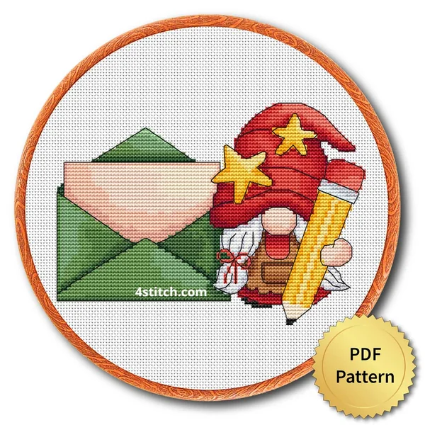 Finished santa mail gnome cross stitch design in a wooden embroidery hoop