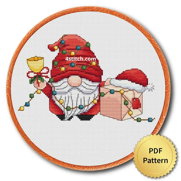 Finished christmas lights gnome cross stitch design in a wooden embroidery hoop