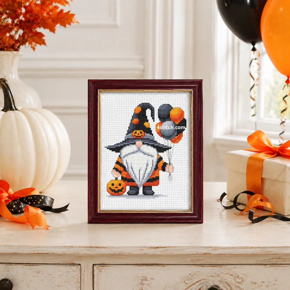 Small framed Halloween Balloon Witch Gnome stitched on white Aida in a bright themed interior; complete original motif and 4stitch.com watermark.