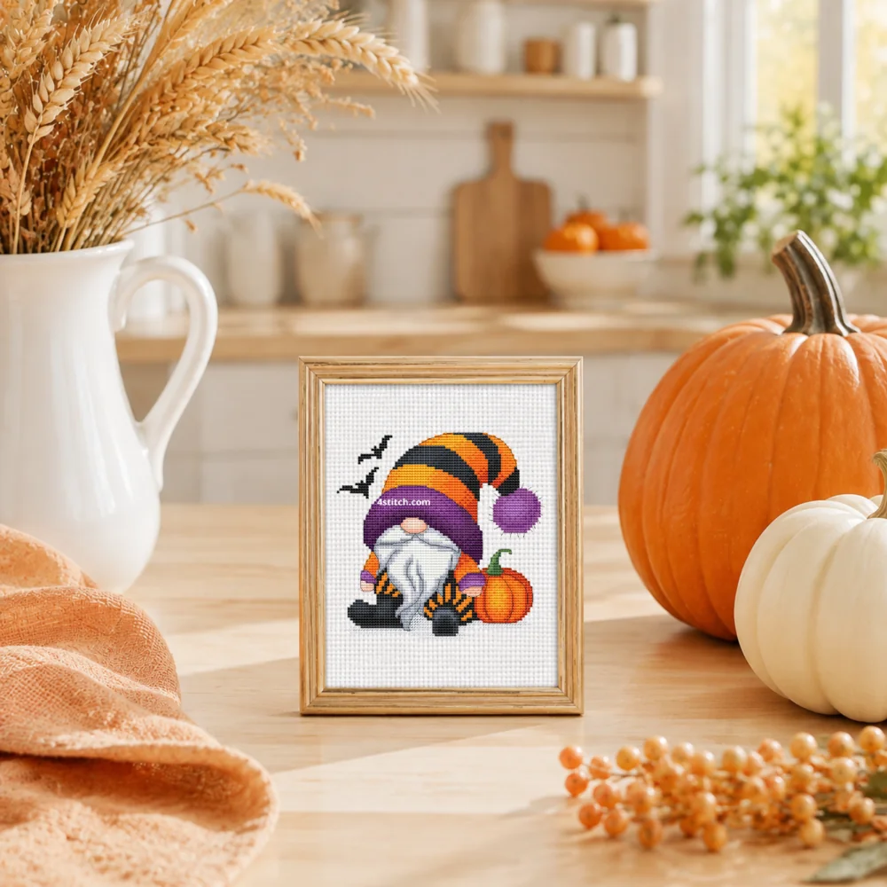 Small framed Pumpkin Patch Gnome on white Aida in a bright themed interior, with the complete original motif and its 4stitch.com watermark.