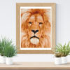 A cross stitch pattern featuring the majestic African lion, with its golden fur and intense gaze