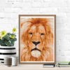 A cross stitch pattern featuring the majestic African lion, with its golden fur and intense gaze