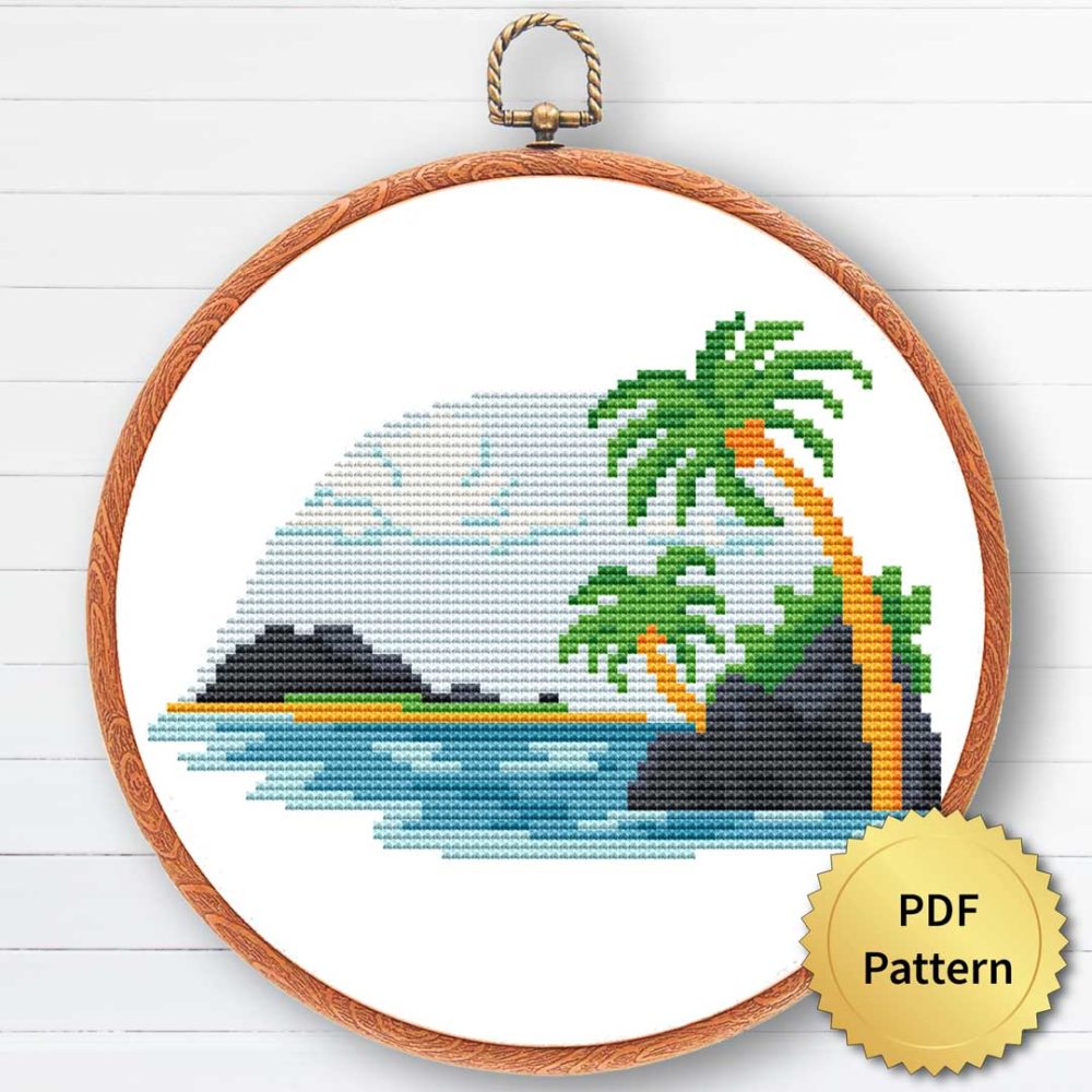 Image of the Beach Sea Cross Stitch Pattern, featuring a serene ocean view with a beach and palm trees in the foreground.