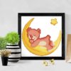 A cross stitch pattern featuring a cute Pull Bear on The Moon