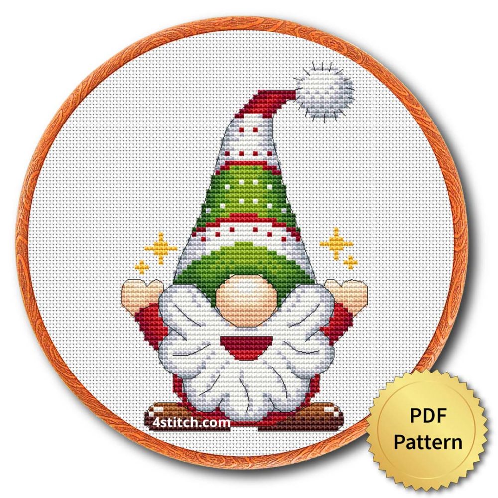 Sparkling Tree Hat Gnome Cross Stitch Pattern shown in an embroidery hoop with a gold PDF Pattern medal