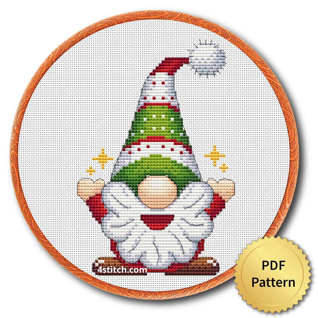 Sparkling Tree Hat Gnome Cross Stitch Pattern shown in an embroidery hoop with a gold PDF Pattern medal