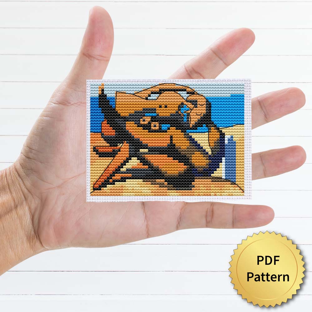 Figure at the seaside by Pablo Picasso cross stitch pattern featuring a beautiful reproduction of the iconic painting