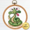 Snake Cross Stitch Pattern, featuring a snake in the center.