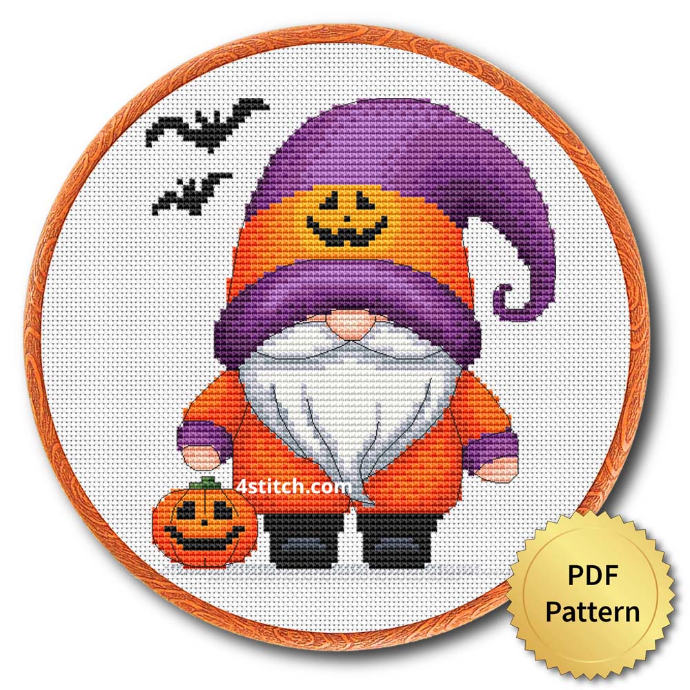 Pumpkin Hoodie Halloween Gnome displayed on white Aida in a wooden embroidery hoop with a PDF pattern badge