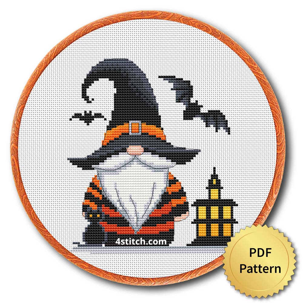 Lantern Witch Hat Gnome displayed on white Aida in a wooden embroidery hoop with a PDF pattern badge