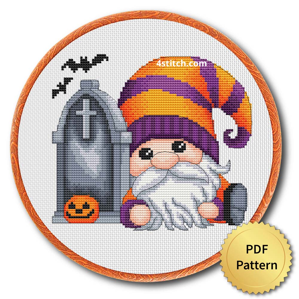 Sleepy Tombstone Halloween Gnome displayed on white Aida in a wooden embroidery hoop with a PDF pattern badge