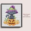 Halloween Cat Cross Stitch Pattern - Image of a finished cross stitch project with a black cat wearing a witch hat.