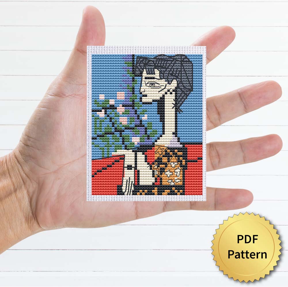Jacqueline by Pablo Picasso cross stitch pattern featuring a beautiful reproduction of the iconic painting
