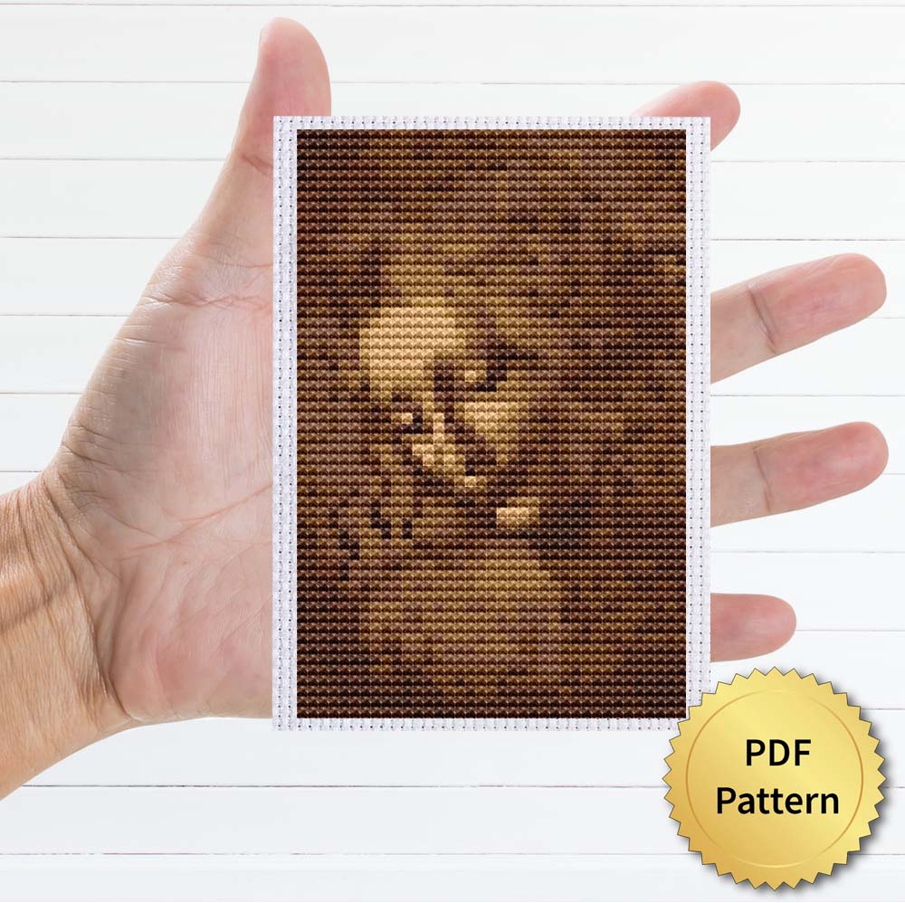 The Lady with Dishevelled Hair, La Scapigliata cross stitch pattern featuring a beautiful reproduction of the famous Leonardo Da Vinci painting