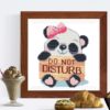 Panda with 'Do Not Disturb' message cross stitch pattern featuring a cute panda holding a sign
