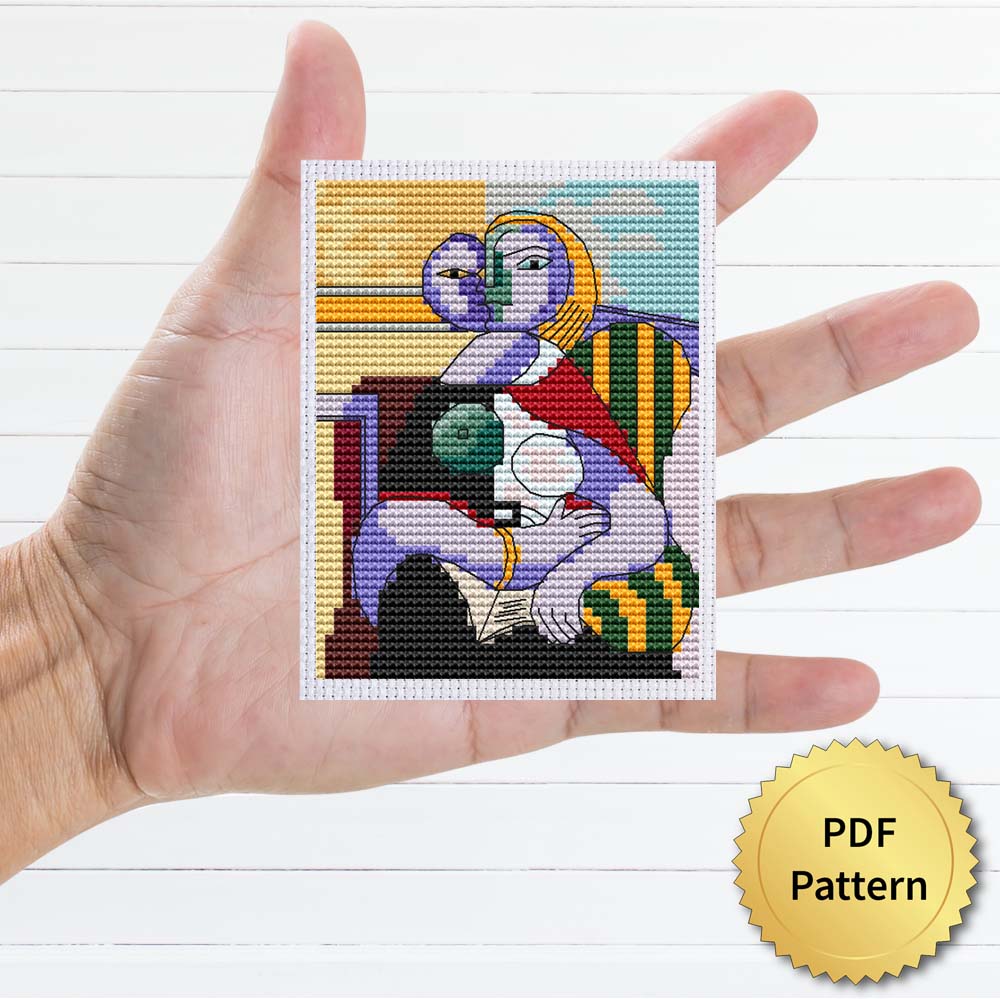 Reading by Pablo Picasso cross stitch pattern featuring a beautiful reproduction of the iconic painting