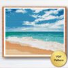 Image of the Beach Sea Cross Stitch Pattern, featuring a serene ocean view with a beach and palm trees in the foreground.