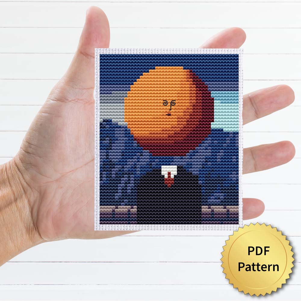 The Art of living cross stitch pattern featuring a beautiful reproduction of the famous Rene Magritte