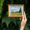 Wheat Field with Cypresses cross stitch pattern featuring a beautiful reproduction of the famous Vincent van Gogh painting